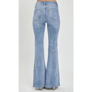 NWT Free People We The Free flared denim jeans featuring a raw, frayed hem 24